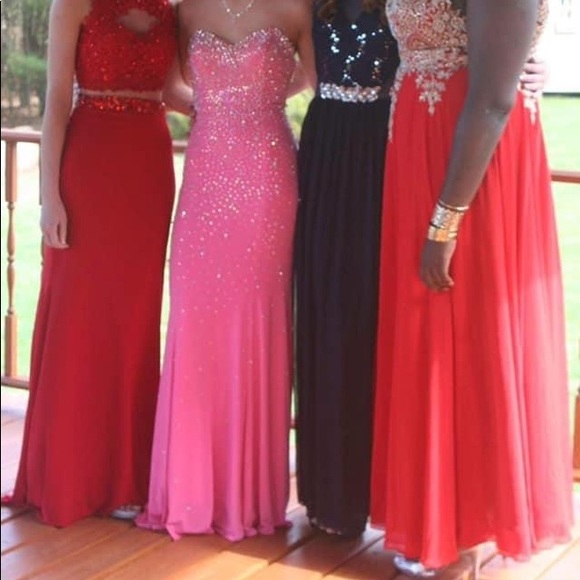 Jeweled form fitting prom dress with long train. - Picture 2 of 2